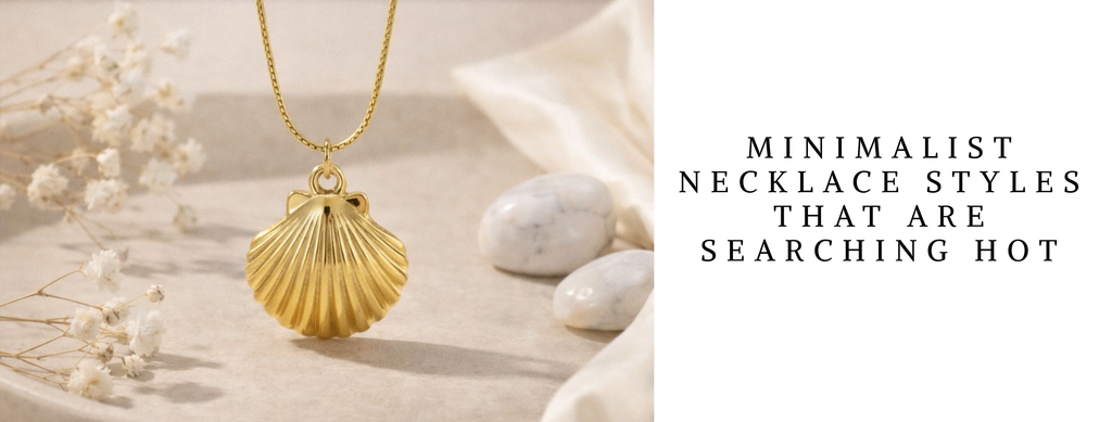 Minimalist gold necklace with a delicate fine chain and small solitaire pendant, styled for everyday wear against a clean neutral background.