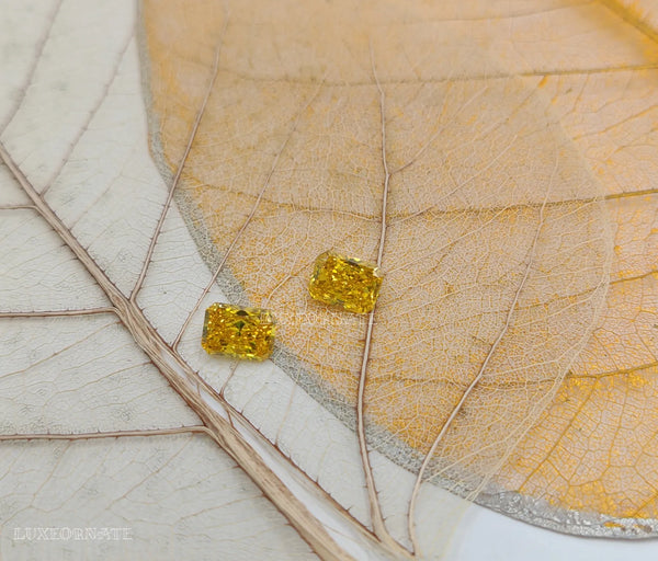 Fancy Vivid Yellow Radiant Cut Diamonds