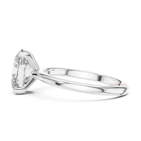 Oval solitaire diamond ring close up fine jewelry product photography