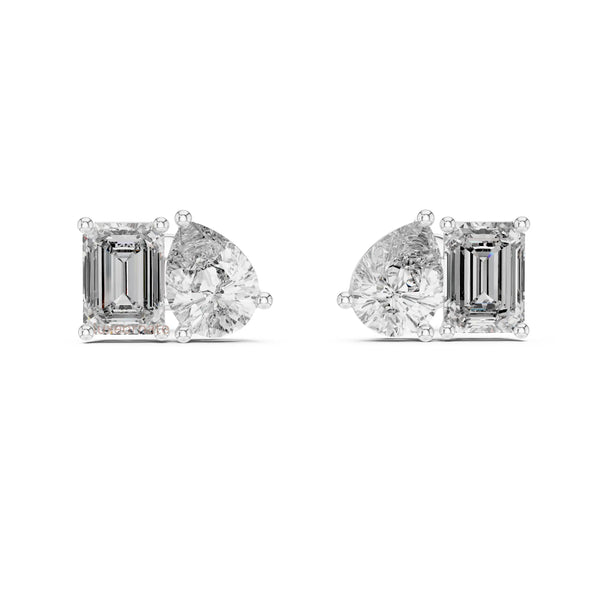 High end white gold toi et moi diamond earrings close up fine jewelry