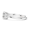 Classic oval diamond engagement ring with side diamonds set in a timeless prong setting