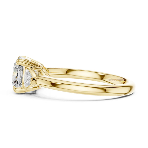 Luxury oval diamond ring in yellow gold featuring a brilliant center stone and perfectly matched side diamonds