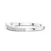 Luxury fine jewelry diamond band ring with polished white gold finish and subtle brilliance