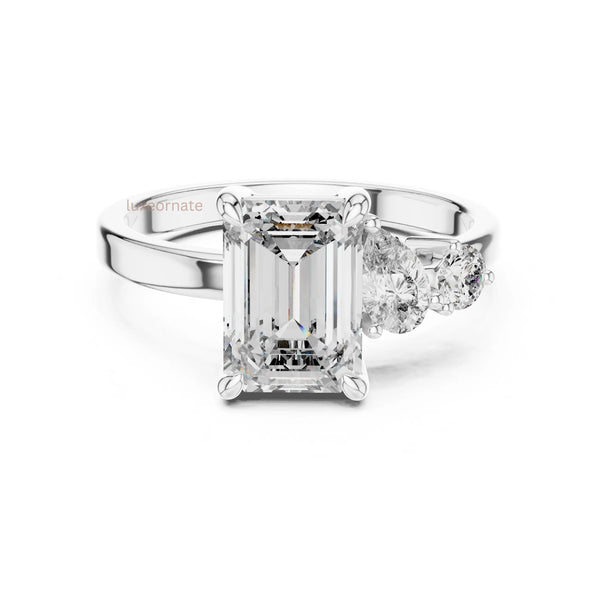 emerald cut diamond with one side two stone ring