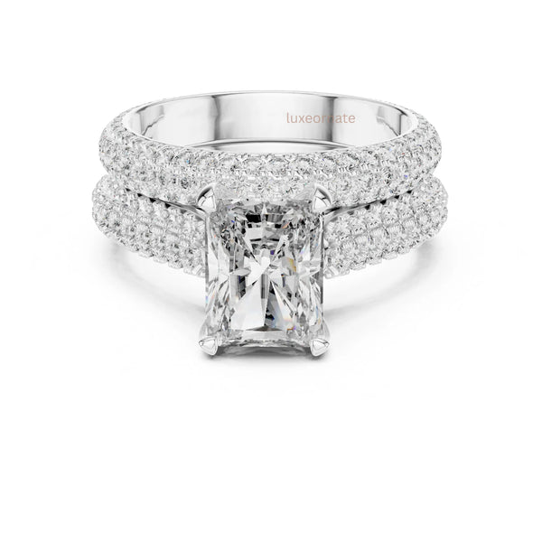 Square prong radiant diamond ring featuring two rows of pave diamonds