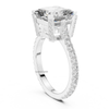 Angled white gold emerald cut diamond engagement ring with pavé shank and detailed gallery setting, rectangular lab grown diamond, modern luxury jewelry.
