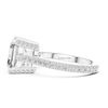 White gold emerald cut solitaire ring with pavé diamond gallery and cathedral setting, rectangular lab grown diamond engagement ring.
