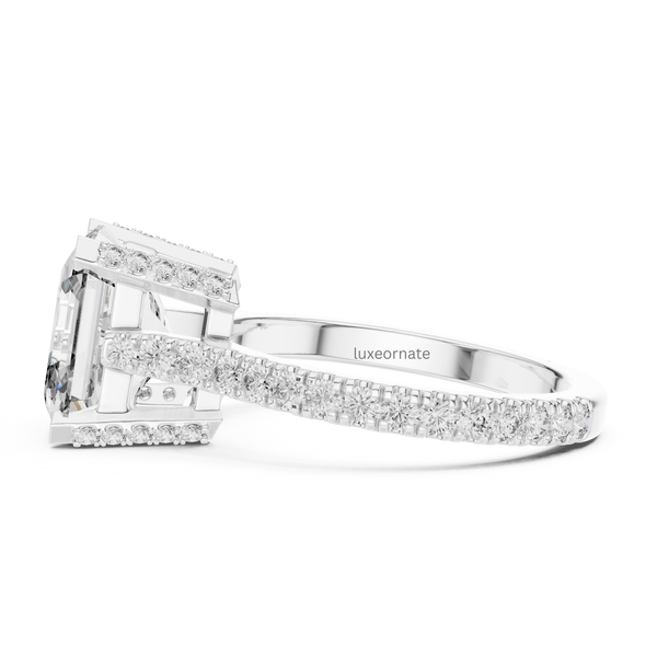 White gold emerald cut solitaire ring with pavé diamond gallery and cathedral setting, rectangular lab grown diamond engagement ring.