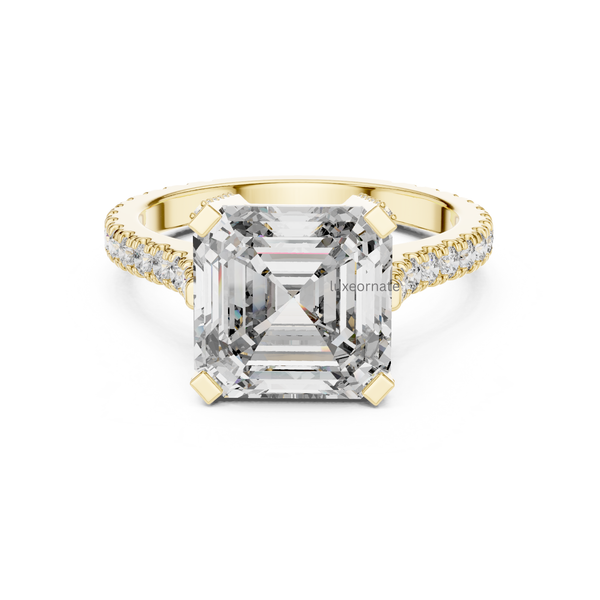 Yellow gold emerald cut solitaire engagement ring with pavé diamond band, rectangular step cut lab grown diamond, modern bridal ring, luxury fine jewelry.