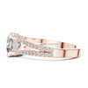 Side profile rose gold cushion cut diamond ring with pavé set split shank and hidden halo.