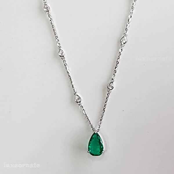 pear cut emerald pendant necklace with diamond chain luxury jewellery
