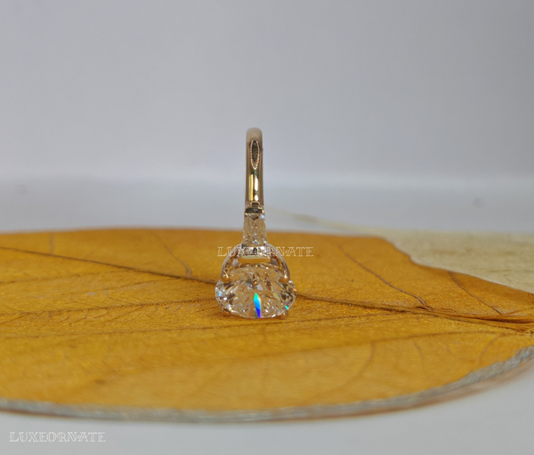 Round Solitaire Diamond Ring with Baguette Accents