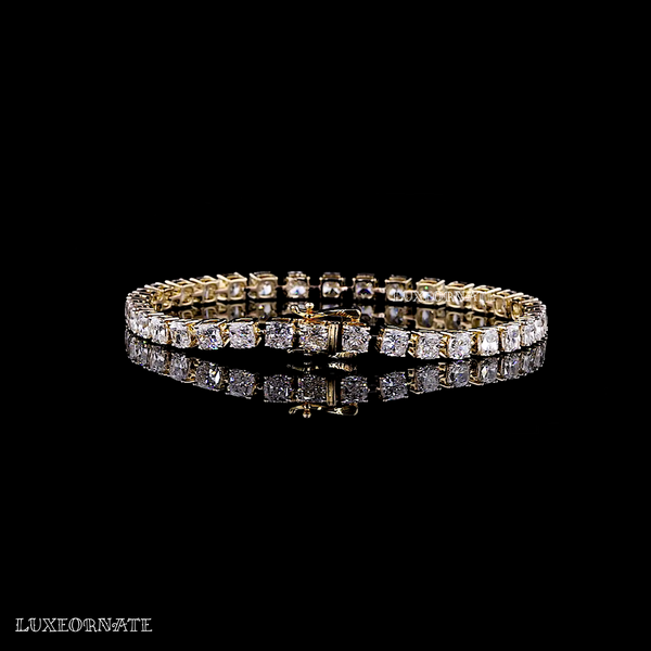 Yellow gold tennis bracelet with Cushion cut diamonds by Luxeornate