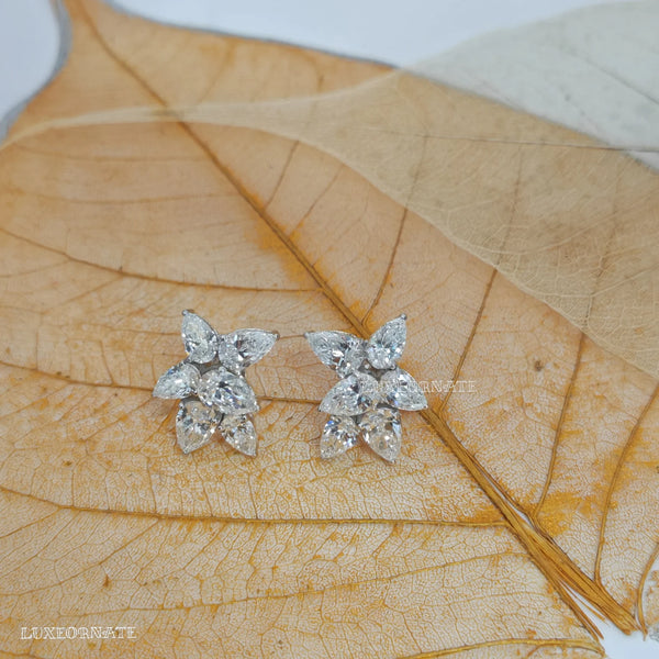 Floral Pear cut diamond cluster stud earrings in white gold with high sparkle luxury finish