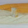 Emerald cut diamond pendant in yellow gold