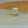 Emerald cut diamond pendant in yellow gold
