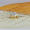 Emerald cut diamond pendant in yellow gold