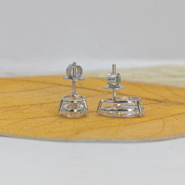 Pear cut solitaire diamond stud earrings in white gold, Teardrop earring, earrings for daily wear