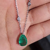 pear cut emerald pendant necklace with diamond chain luxury jewellery