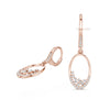 diamond hoop drop earrings in yellow gold with round and baguette diamond accents