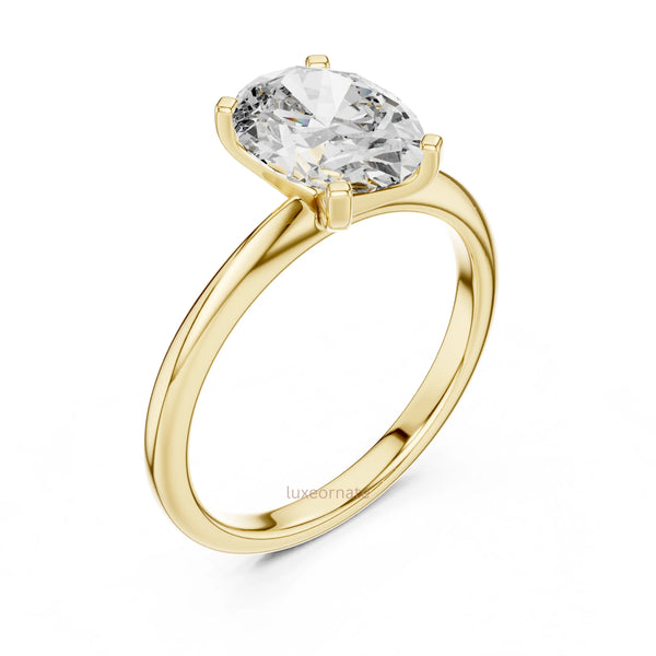 Oval cut solitaire diamond ring with classic four prong setting