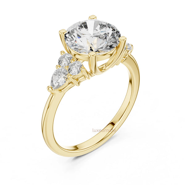 Round brilliant lab grown diamond engagement ring with three side stone design