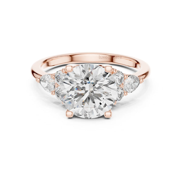 Rose gold round lab diamond gift ring with side stone detailing