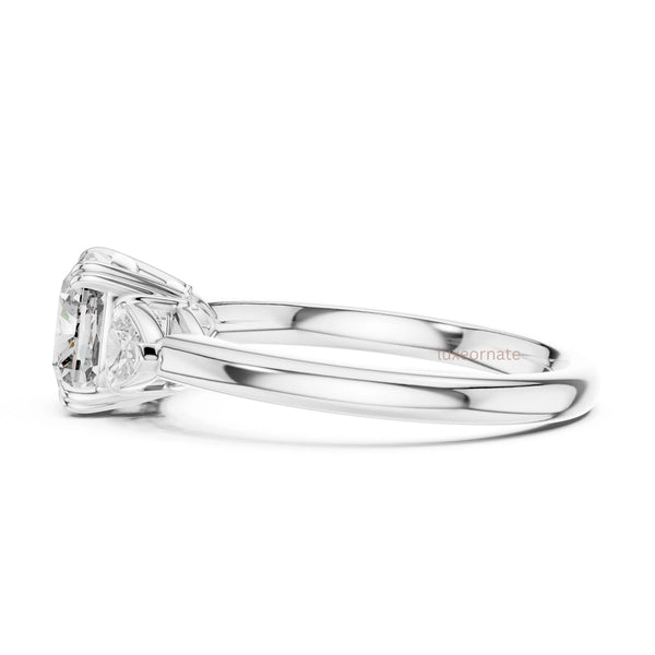 Classic oval diamond engagement ring with side diamonds set in a timeless prong setting