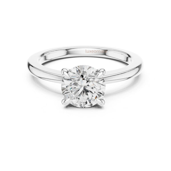 Minimal classic diamond ring in gold designed for proposals anniversaries and meaningful gifting