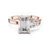 emerald cut diamond with one side two stone ring
