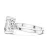 emerald cut diamond with one side two stone ring