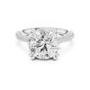 Round brilliant diamond engagement ring in white gold with split pavé shank and six prong setting.