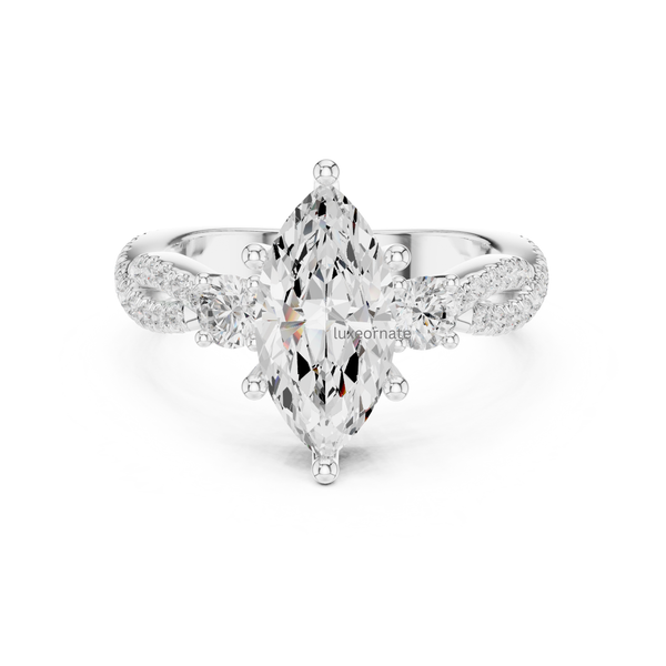 White gold marquise cut diamond ring with round side stones and double pavé band.