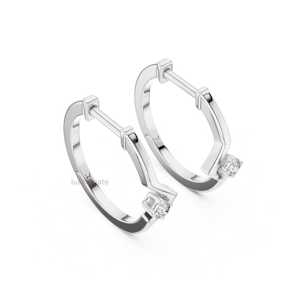 Designer geometric diamond hoop earrings in gold with premium round cut diamond