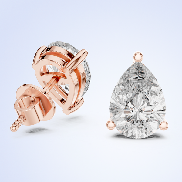 Pear cut lab grown diamond stud earrings in gold three prong setting