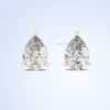 Pear cut lab grown diamond stud earrings in gold three prong setting