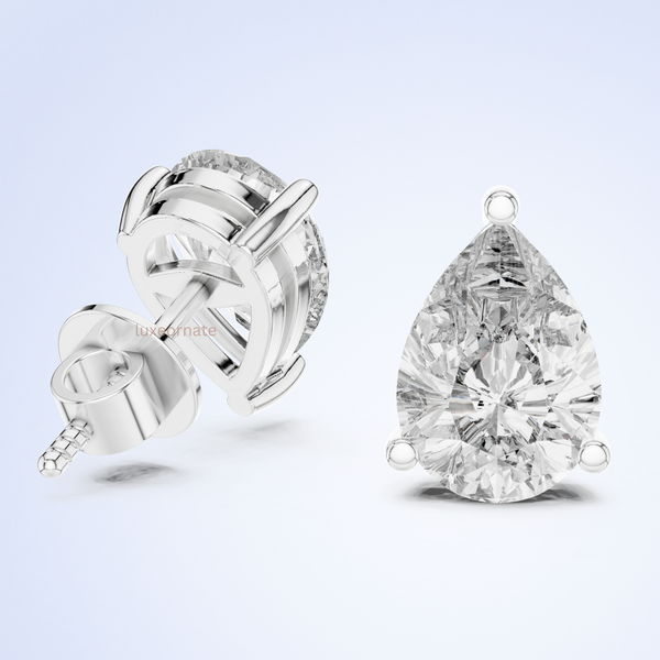 Pear cut lab grown diamond stud earrings in gold three prong setting