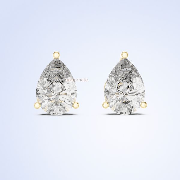Pear cut lab grown diamond stud earrings in gold three prong setting