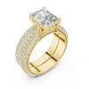 Double row pave diamond ring with round brilliant center stone and square prong setting