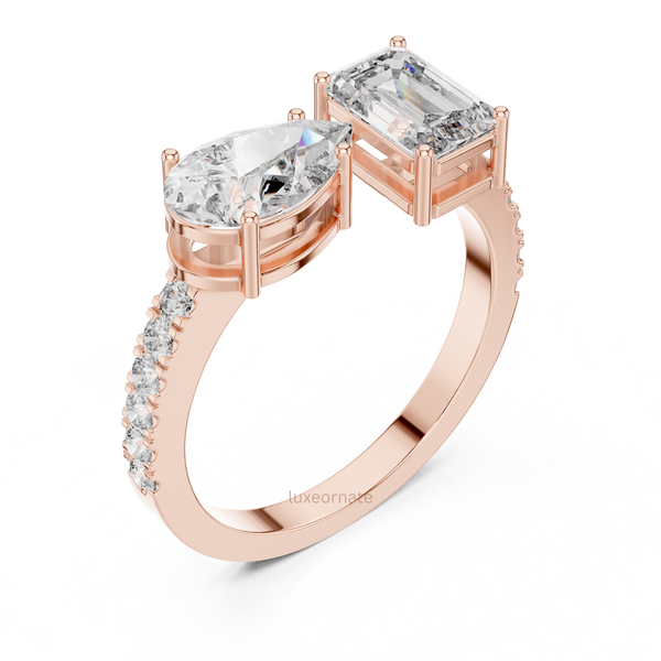 Toi Et Moi lab grown diamond ring with pear and emerald cut stones in 14k rose gold pavé band engagement jewelry