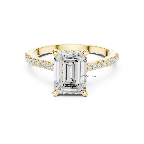 Yellow gold emerald cut diamond engagement ring with pavé diamond band, front view