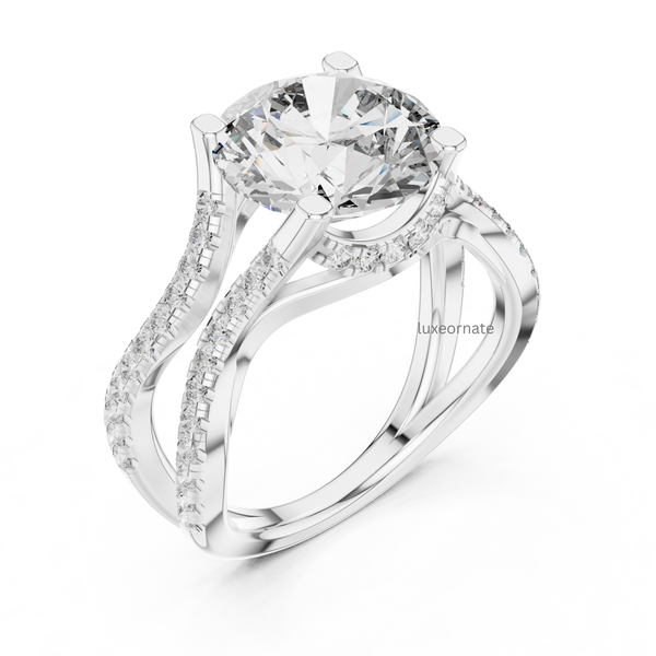 Angled view white gold round brilliant diamond engagement ring with pavé split band.