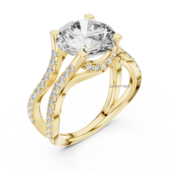 Angled view yellow gold round diamond ring with elevated prong setting and split shank.