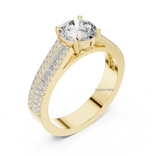 Angled view yellow gold round solitaire engagement ring with triple row pavé and baguette diamonds, lab grown diamond bridal ring, luxury fine jewelry.