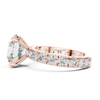 Side profile rose gold round brilliant solitaire engagement ring with pavé diamond band, lab grown diamond bridal ring, romantic luxury jewelry.