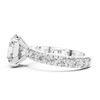 Side view white gold round cut diamond engagement ring with pavé half eternity band, lab grown diamond bridal jewelry, luxury fine ring.