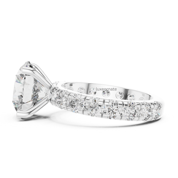 Side view white gold round cut diamond engagement ring with pavé half eternity band, lab grown diamond bridal jewelry, luxury fine ring.