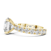 Side profile yellow gold round brilliant solitaire ring with pavé diamond band and elevated prong setting, lab grown diamond engagement ring.