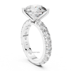Angled white gold round brilliant diamond ring with pavé set band and cathedral prong setting, lab grown diamond engagement jewelry.