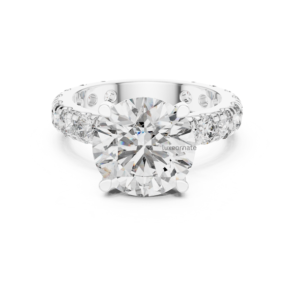 White gold round brilliant diamond engagement ring with pavé set band and four prong setting, lab grown diamond bridal ring, modern fine jewelry.